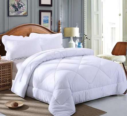 King-size white pure cotton duvets image 3