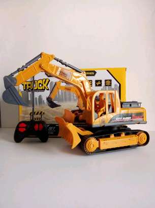 Battery operated excavator
Has music and LED lights image 7