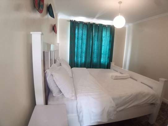 Serviced 3 Bed Apartment with Balcony at Walk To Yaya Center image 14
