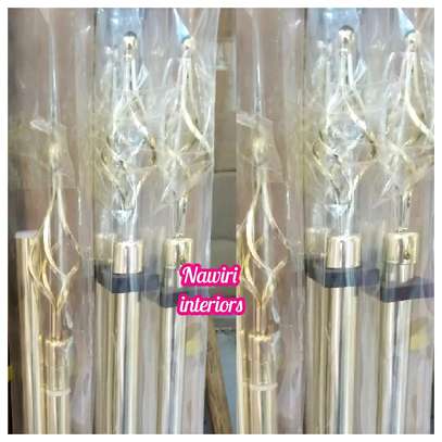 Extendable gold curtain rods. image 1
