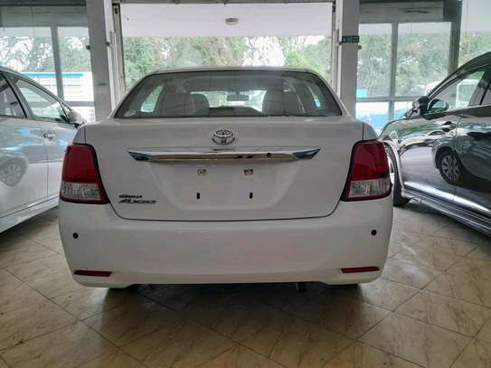 Toyota axio pearl white image 11