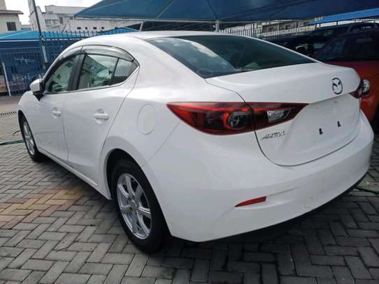 Mazda axela new shape white color image 2
