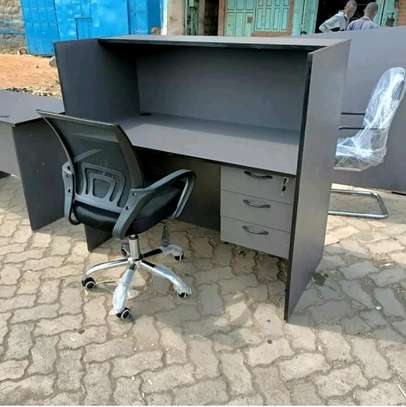 Reception desk plus an office chair image 1