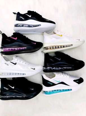Black and white nike classic sneakers image 1