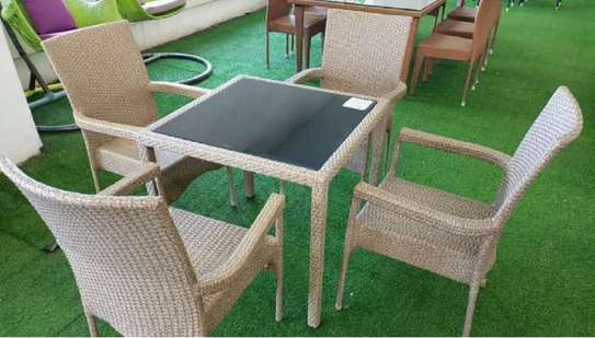 classy relaxing area with artificial grass carpet image 2