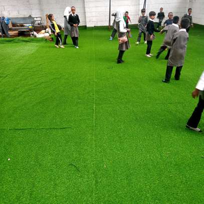 Synthetic green turf grass carpet image 1