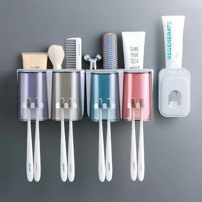 Wall mounted Toothbrush and toothpaste dispenser with 4 cups image 1