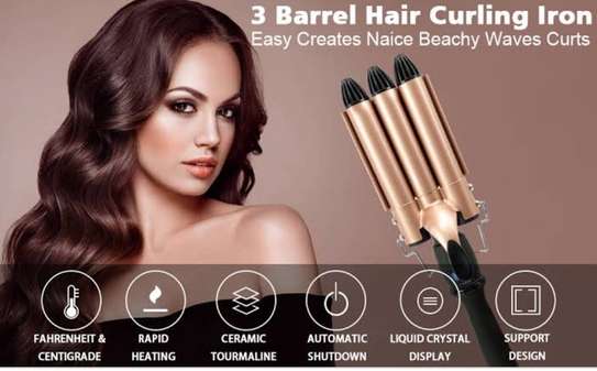Hair curler with triple barrel iron image 2
