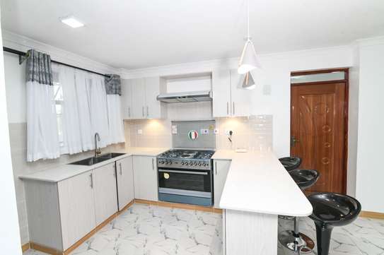Serviced 2 Bed Apartment with Balcony at South image 7