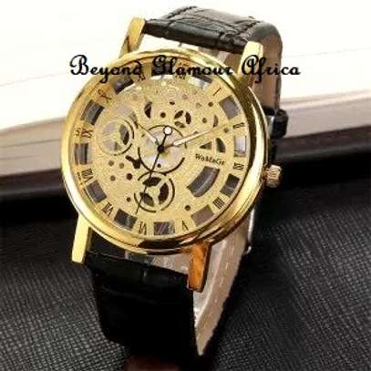 Unisex Gold Tone skeleton  watch with  African box image 4