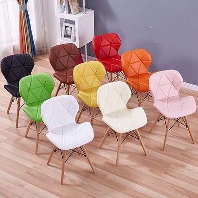 Dining Chairs; Padded Eames seats image 1