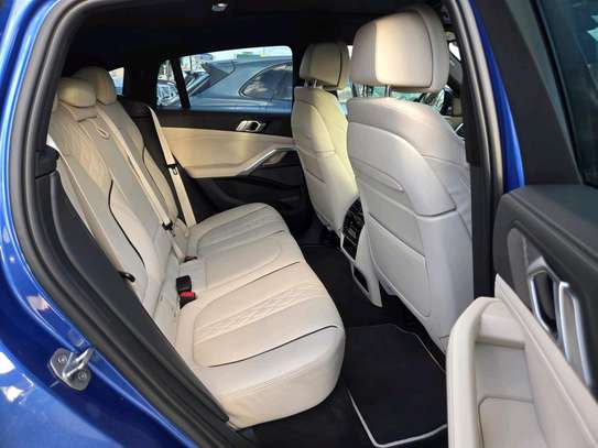 Make BMW X6 Blue colour 2020 model fully loaded. image 7