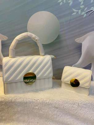 White designer handbags image 1
