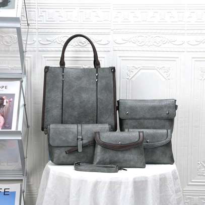 *Quality Original Designer Ladies Business Casual Rubber 5 in 1 Legit  Handbags Backpack Clutch Wallet Set*
. image 1