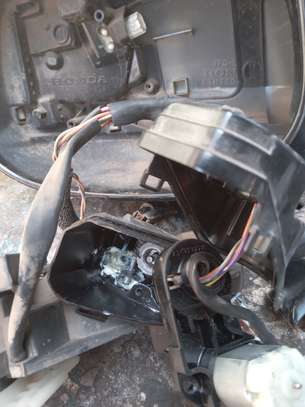 Side mirror motor-gears repair image 1