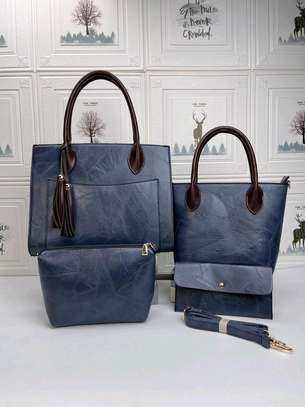 Navy blue designer handbags image 2