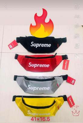 Yellow and red supreme pouch bags image 1