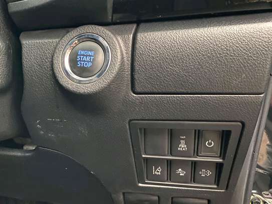 Toyota Hilux black color fully loaded 2019 model. image 14