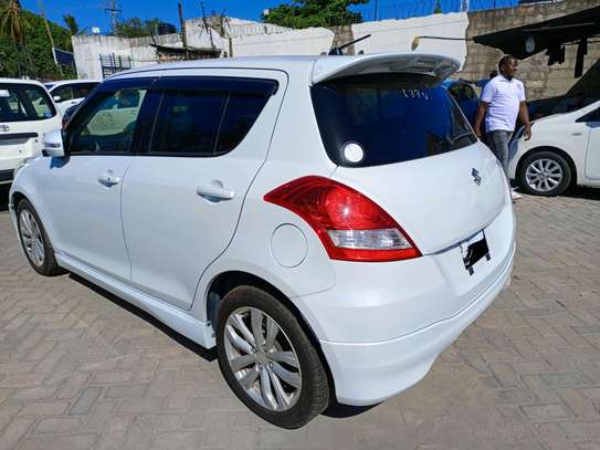 Suzuki swift pearl white image 9