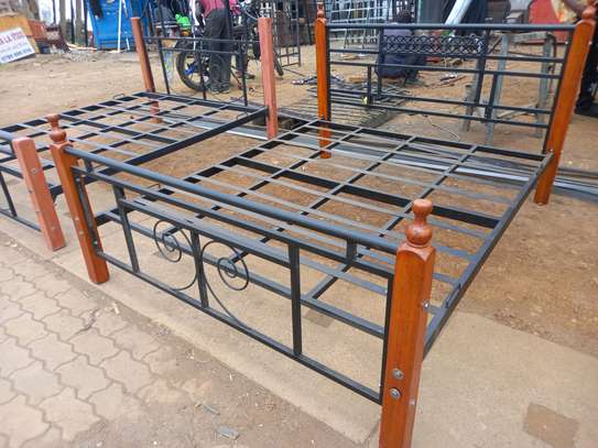 Metal frame wooden posts Beds image 1