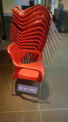 Plastic chairs with metal legs image 2