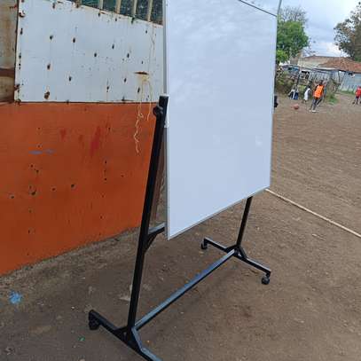 Rotational double sided whiteboards with a stand image 3