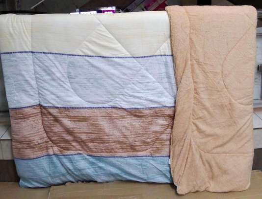 7 piece cotton/woolen duvet sets  with matching curtains. image 2