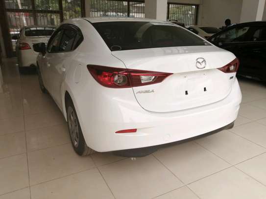 Mazda axela pearl white image 10
