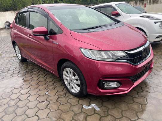 Honda fit hybrid maroon image 6