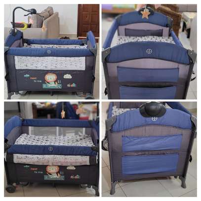 Foldable Baby Crib with Mattress image 1