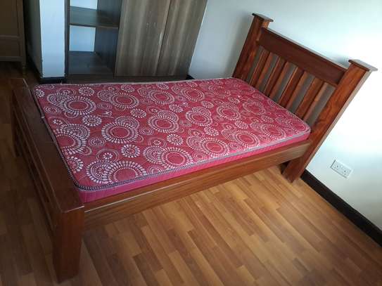 Brown Hardwood 3 by 6 Bed with Matress image 1