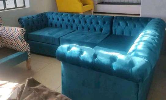 L shaped Tufted sofa image 1