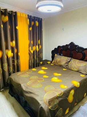 MATCHING CURTAINS AND BEDSHEETS image 1