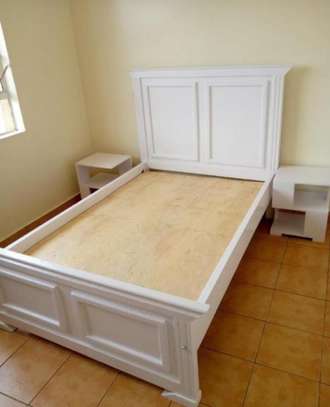White 5*6 hard wood bed image 1