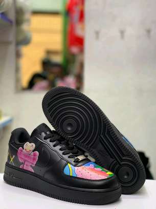 Quality Nike Air Force 1 x Kaws sneakers ,size 40-45,now accessible..price Kshs 3,500. image 1