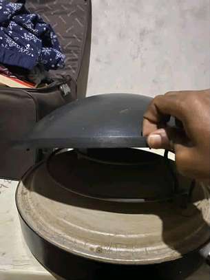 A chapati or flat bread maker image 1