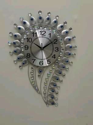 *????Question mark and Eye Design wall clocks  

Available in Gold is and silver image 1