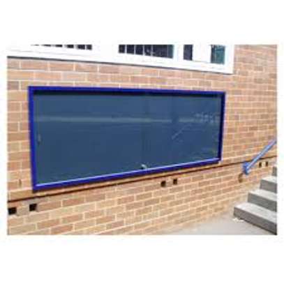 glass sliding noticeboard 8*4 fts image 1