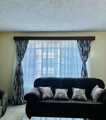 Matched grey curtains image 1