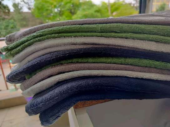 Coloured cotton towels image 1