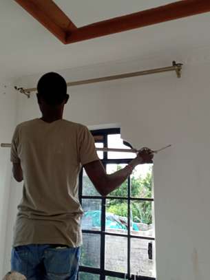 Expert curtain rods and mosquito net installation image 3
