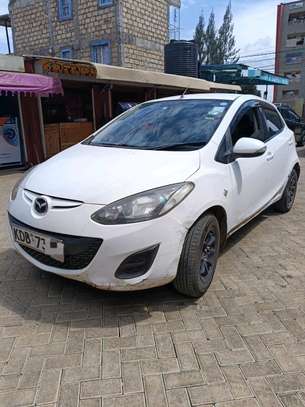 Mazda Demio Manual Petrol White Compact Car image 3