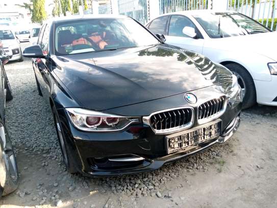 Black BMW 320i image 5