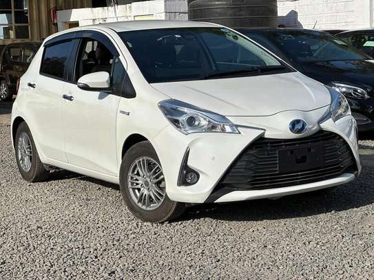 Toyota vitz hybrid white color 2019 model fully loaded image 2