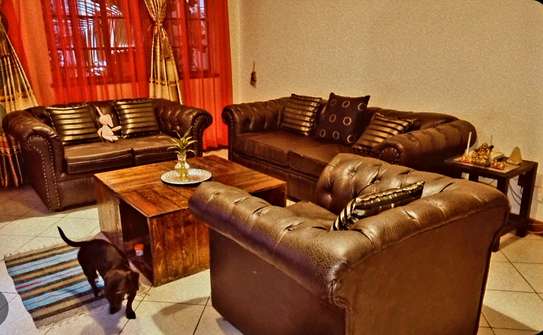 Faux Leather 6 Seater Sofa Very Well Maintained. image 2