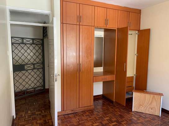 3 bedroom apartment master Ensuite with a cloakroom image 6