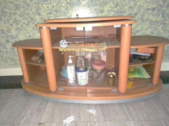 TV cabinet with glass doors image 4