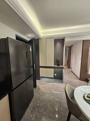 Luxury Living & Dining Room with Marble Floors image 11