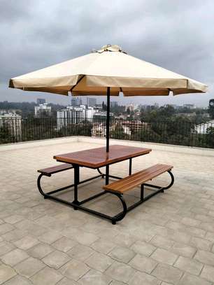 Outdoor bench and umbrella image 2