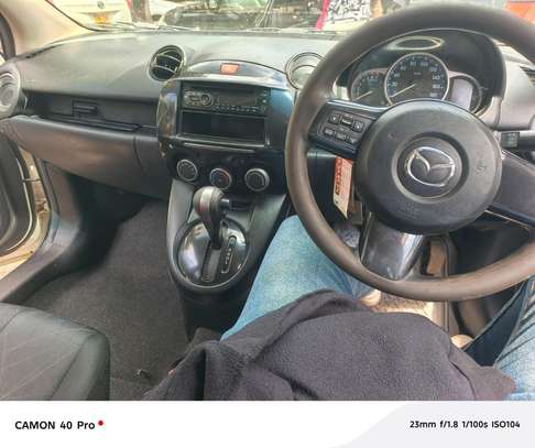 Mazda demio 1300cc white image 4